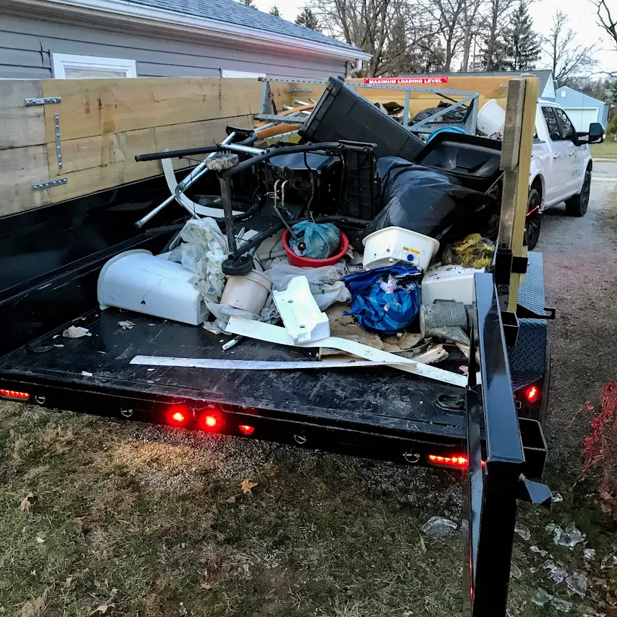 Roll-off dumpster delivered to a residential driveway in Stratmoor